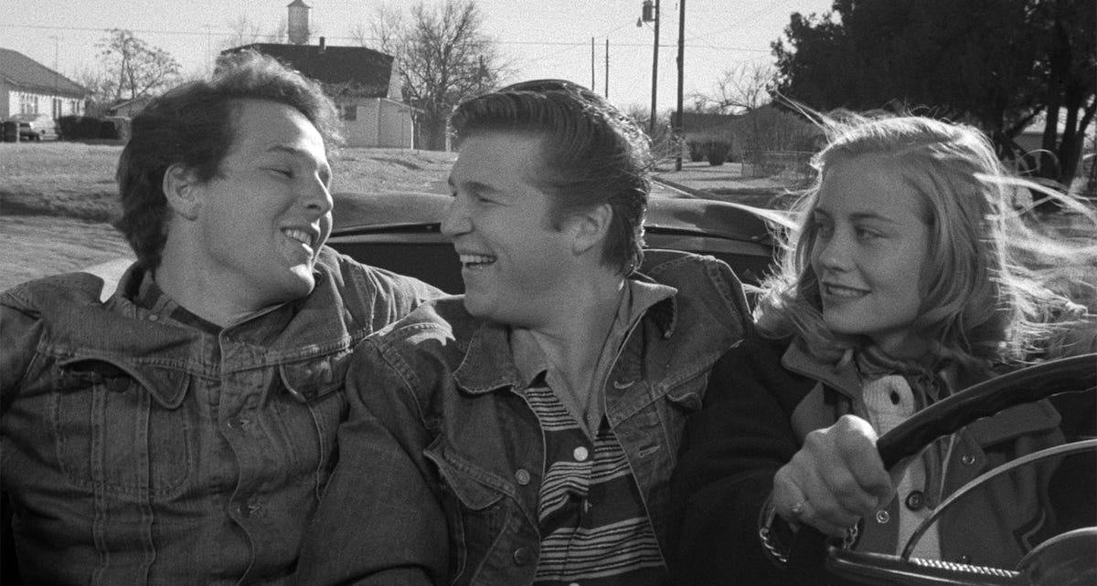 Sonny (Timothy Bottoms), Duane (Jeff Bridges) and Jacy (Cybil Shepherd) driving together in the 1971 film, The Last Picture Show.