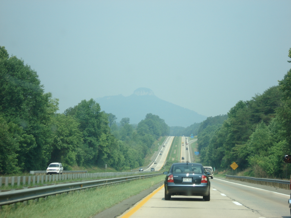 The open road somewhere in the United States. Just a highway.
