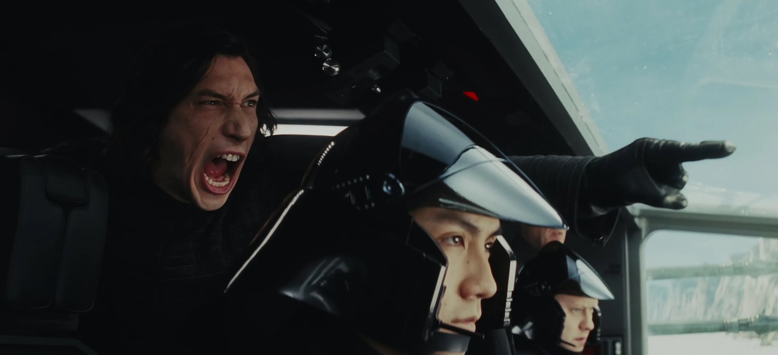 Kylo Ren, a furious white twenty-year-old, screams and points